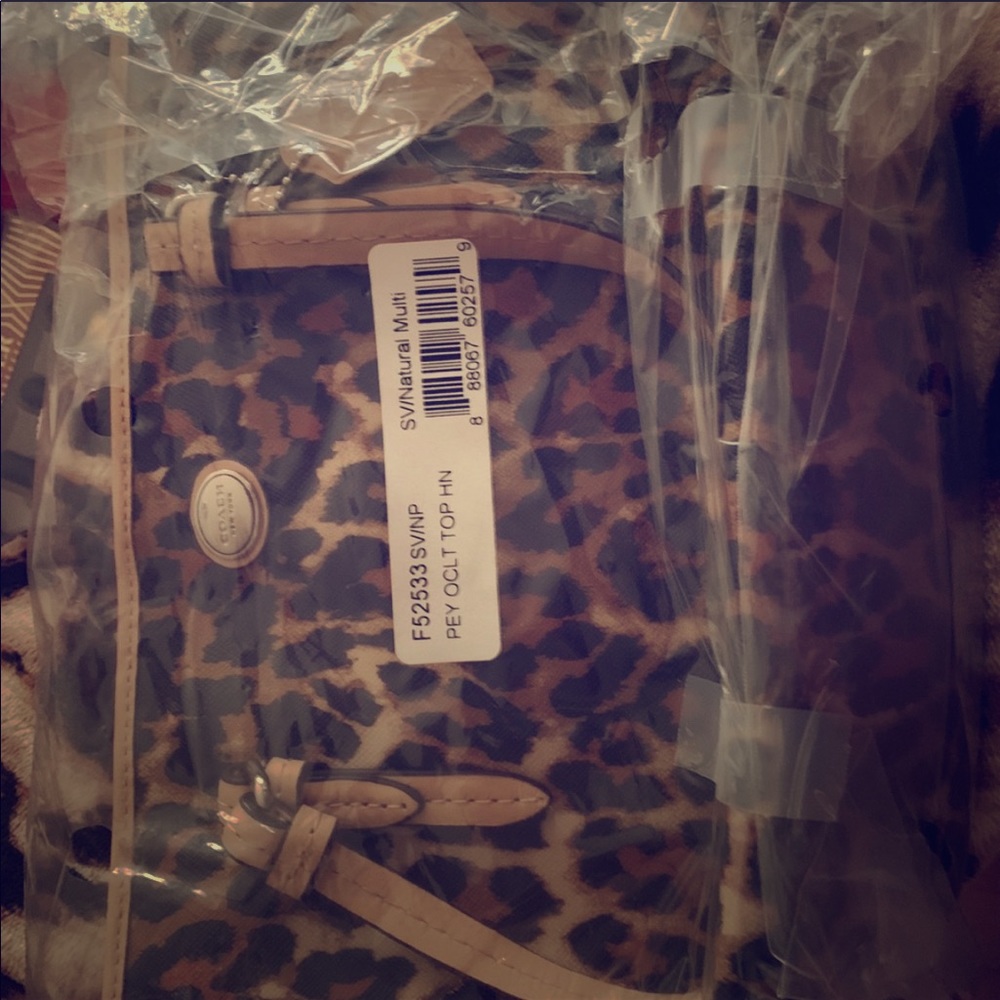 Small coach leopard/cheetah handbag